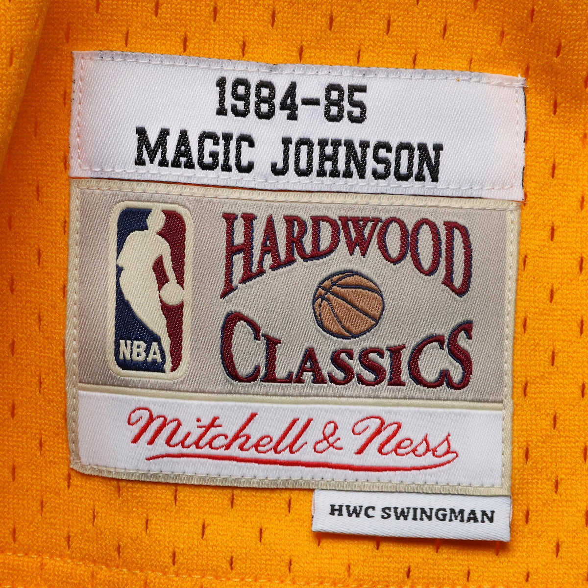Los Angeles Lakers NBA Men's Mitchell & Ness Magic Johnson Gold 1984-85 Hardwood Classics Swingman Jersey