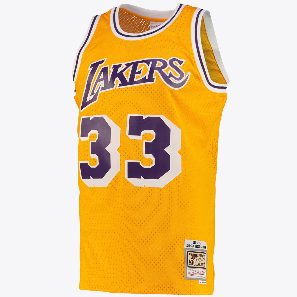 Los Angeles Lakers NBA Kareem Abdul-Jabbar Road Swingman Jersey By Mitchell & Ness - Light Gold - Men's
